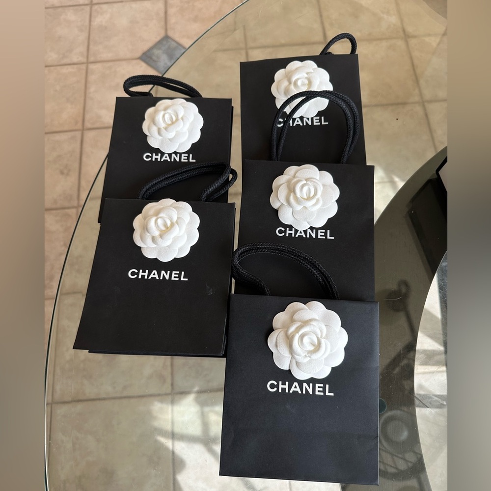 Chanel Black Bag with White Floral Detail